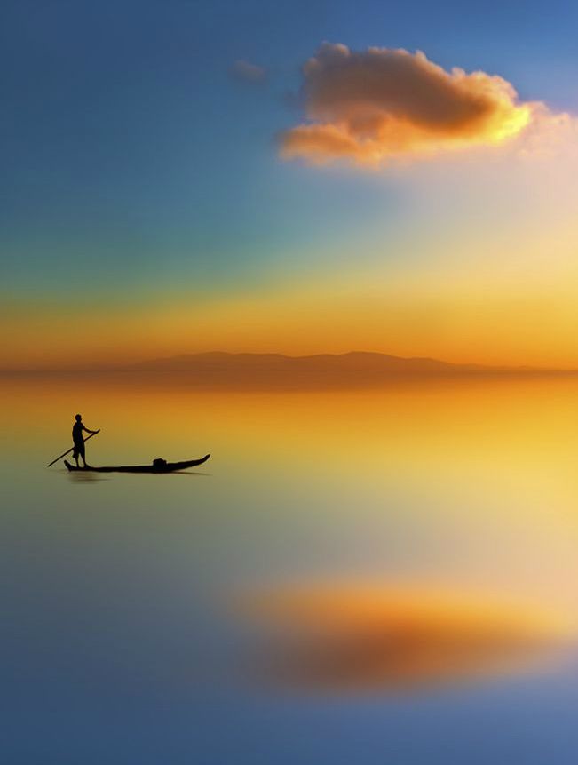 A person paddling alone across calm water beneath a golden sky, symbolizing the journey inward and the discovery that peace cannot be found outside oneself.