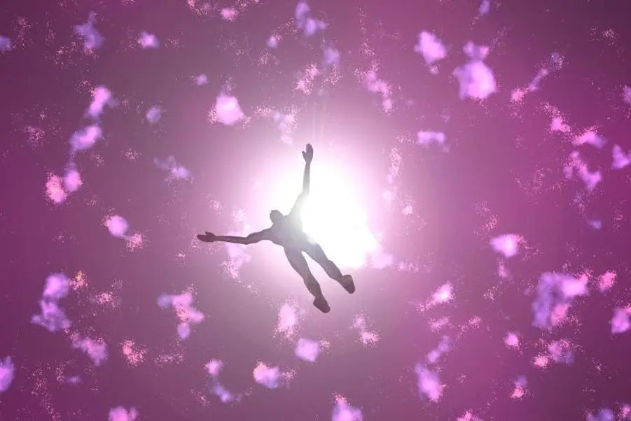 Silhouette of a person ascending into a radiant astral realm