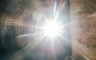 Bright light streaming through a doorway, symbolizing memory, reflection, and the enduring impact of love