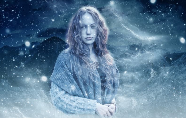 Woman standing in a snowy, dreamlike landscape, symbolizing emotional exploration, inner awareness, and self-discovery