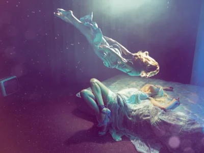 Artistic depiction of an out-of-body experience showing a person separating from their physical body