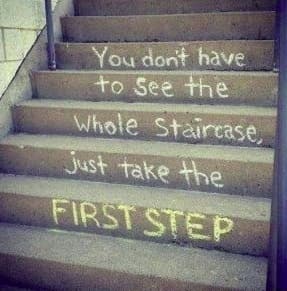 Stairs with motivational message reading you do not have to see the whole staircase just take the first step