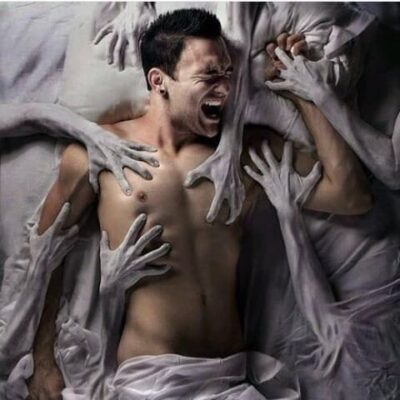 Nightmare imagery showing a person experiencing intense fear during sleep, symbolizing nightmares and night terrors
