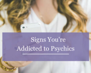 Woman holding a phone representing signs of psychic addiction and dependency on readings.
