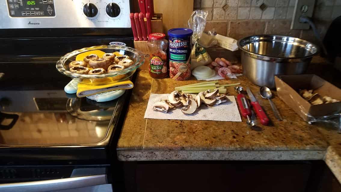 whole mushrooms, chopped onions, bread crumbs, butter, Parmesan cheese, cooked shrimp, celery, picante sauce